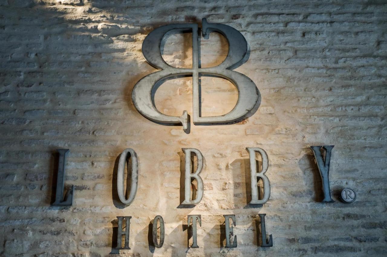 Hotel Lobby セビリア エクステリア 写真 The logo of the 88th Fighter Group